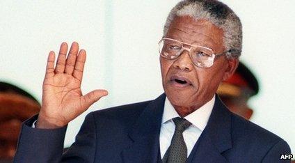 South African President Nelson Mandela taking the oath during his inauguration at the Union Building in Pretoria