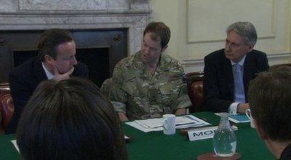 David Cameron, Maj Gen Patrick Sanders, and Defence Secretary Philip Hammond