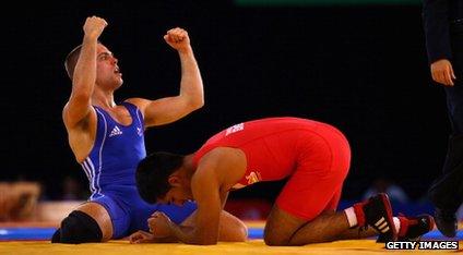 Craig Pilling raises his fists in the air