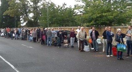 People queuing for water