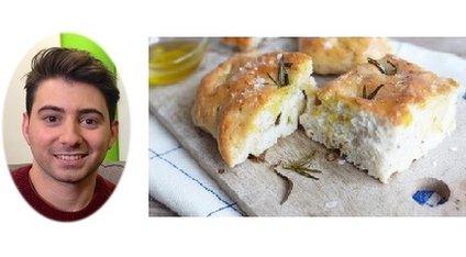 Ricky next to a plate of focaccia bread