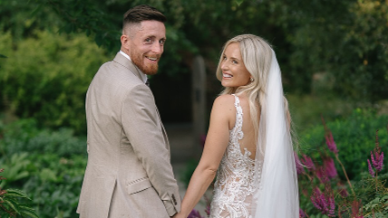 Adam Dodd and his wife Kat on their wedding day