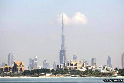 The Dubai skyline. The Burj Khalifa stands prominently in the centre, reaching into the sky.