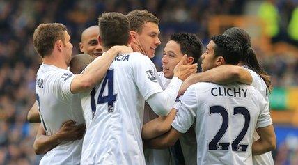 Manchester City players celebrate a goal