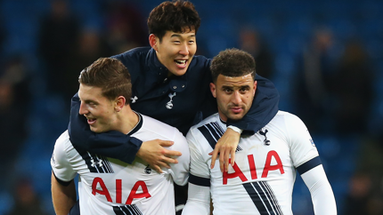 Son Heung-Min of Tottenham Hotspur celebrates victory with Kevin Wimmer and Kyle Walker of Tottenham Hotspur after the Barclays Premier League match between Manchester City and Tottenham Hotspur at Etihad Stadium on February 14, 2016 in Manchester, England. 