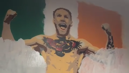 White paint on a mural of Conor McGregor 