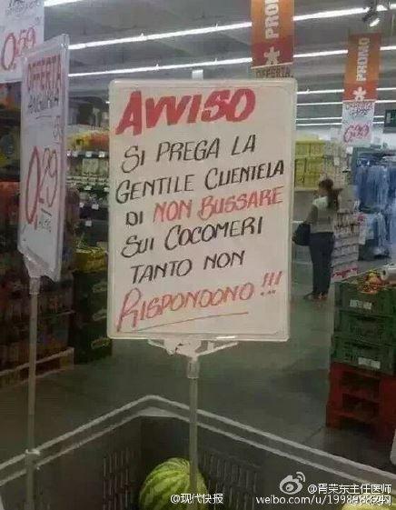 Photo of a sign in an Italian supermarket, placed in a cart full of watermelons. Translated from Italian it reads: "Please stop knocking on the watermelons; they will not respond to it."