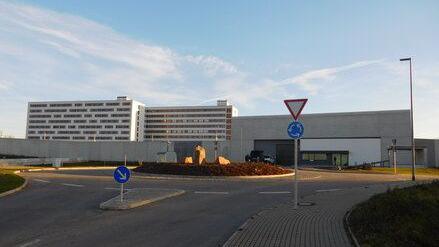 Buildings surrounded by a concrete wall at Chemnitz women's jail