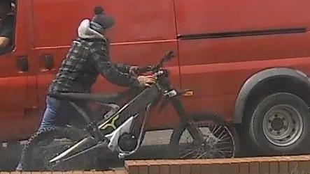 CCTV image showing e-bike rider