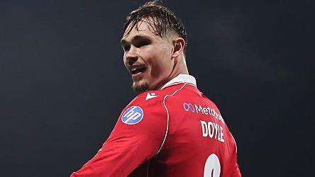 Callum Doyle smiles as he celebrates after scoring against Chelsea in the FA Cup
