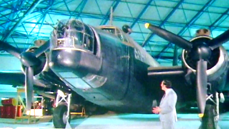 A Wellington bomber aircraft in a hangar.