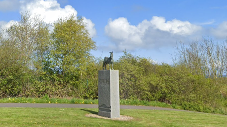 Plinth with a pony statue on top.