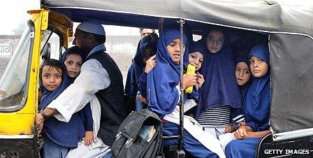 Children in the Indian city of Bhopal are ferried to school