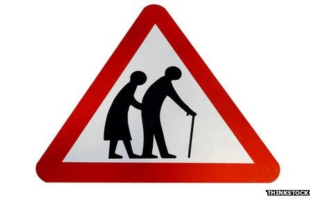 road sign showing old people