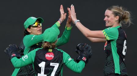 Southern Brave players celebrate a wicket