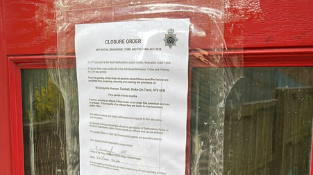 The closure order on the door