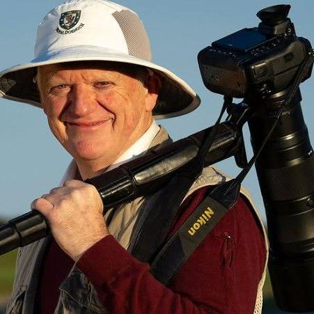 Matthew Harris, golf photographer, with his camera