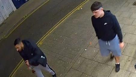 Two men in casual clothing caught on CCTV