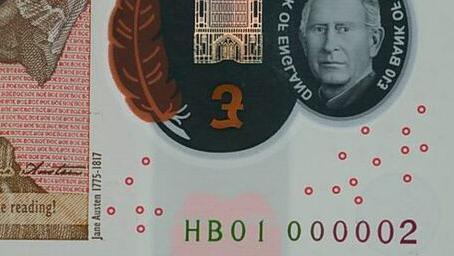 Close up of serial number on banknote