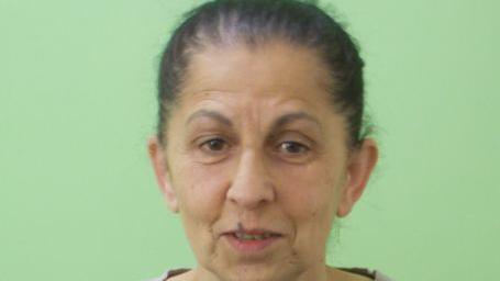 Biljana Zekavica - A woman with brown hair, brown eyes and a brown face.
