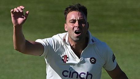 Harry Conway celebrates taking a wicket for Northamptonshire