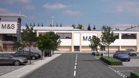 CGI of an expanded M&S at Brotherhood Shopping Park. It is a two storey rectangular building in a car park. It sits between the current M&S and a shop called Tapi. 

