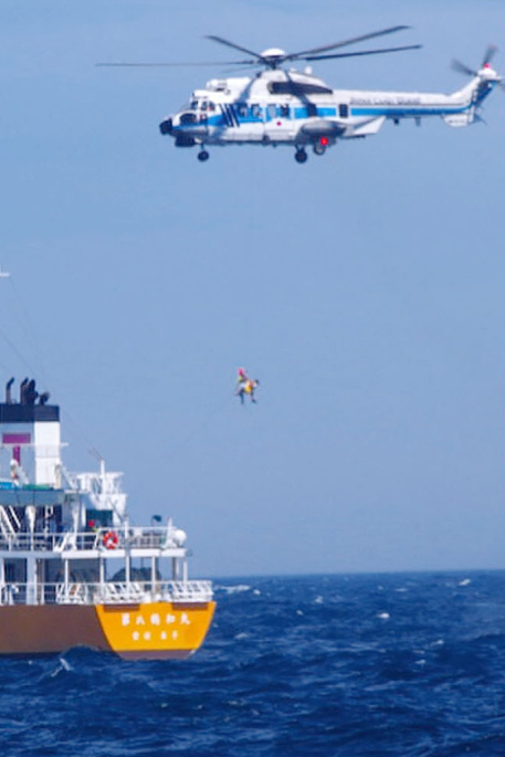 A Coast Guard helicopter airlifts the woman to take her to hospital