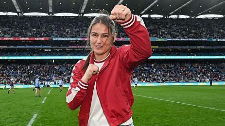 Katie Taylor on the Croke Park pitch at half-time in this year's Leinster hurling final 