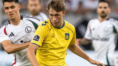 Bartosz Kapustka , Oscar Schwartau during UEFA Conference League qualifying round match Legia Warsaw vs Broendby Copenhagen in Warsaw, Poland on 15 August, 2024