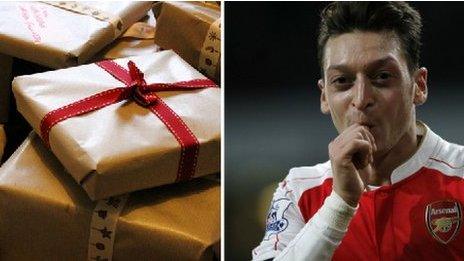 Mesut Ozil with presents