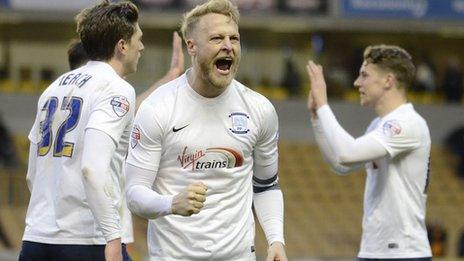 Tom Clarke and Preston celebrate