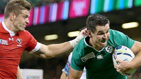 Jonathan Sexton runs in Ireland's third try against Canada