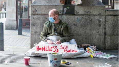 Homeless man on street