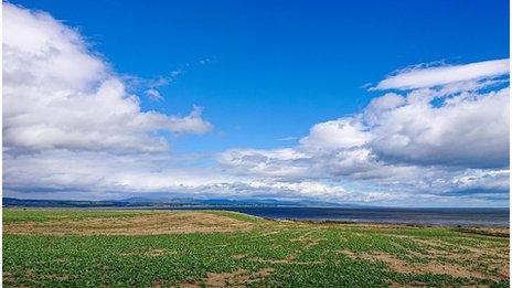 Dry UK landscape with blue sky and clouds