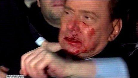 Screengrab from video footage of attack on Silvio Berlusconi (December 2009)