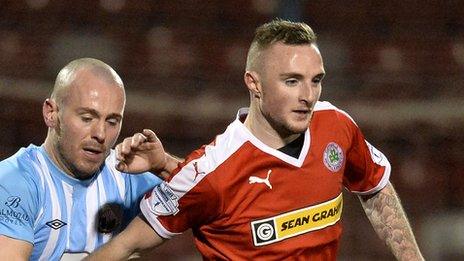 Jude Winchester (right) scores twice in the second half of Cliftonville's game against Warrenpoint Town