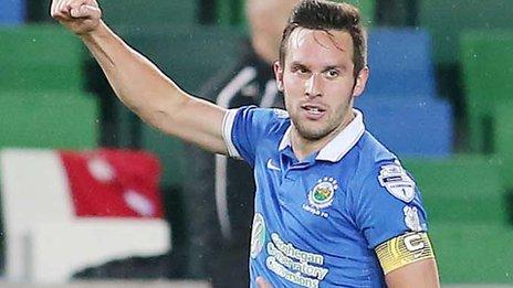 Linfield striker Andrew Waterworth celebrates scoring against Cliftonville