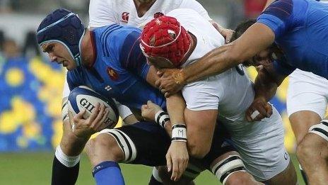 James Haskell makes a tackle for England v France