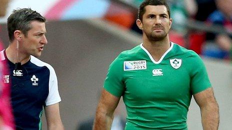 An injured Rob Kearney leaves the Wembley pitch for treatment