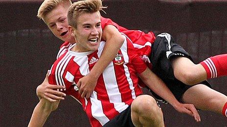 Southampton scorer Jake Vokins is congratulated by team-mate Joe Tomlinson