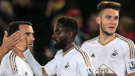 Matt Grimes celebrates his strike with team-mates