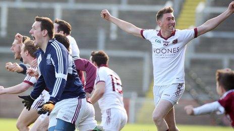 Slaughtneil players celebrate at the final whistle