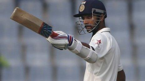 Ajinkya Rahane celebrates his half century