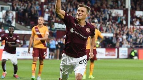 Gavin Reilly celebrates scoring for Hearts