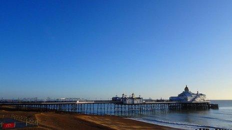 Clear blue sky over Eastbourne pier