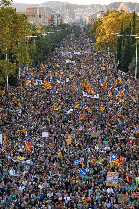 People gather during a pro-independence demonstration called by Catalan National Assembly (ANC) and Omnium Cultural organisations, against the conviction of Catalan separatist leaders for the 2017 attempted secession, in Barcelona, on October 26, 2019