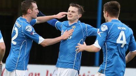 Dungannon striker Paul McElroy celebrates scoring against Warrenpoint