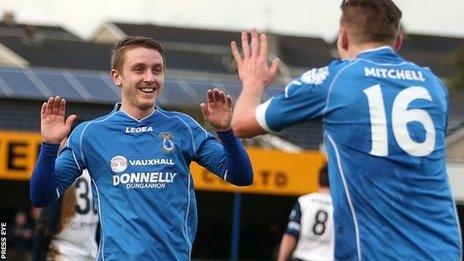 Alan Teggart celebrates with Andrew Mitchell after scoring against Ballinamallard at Stangmore Park