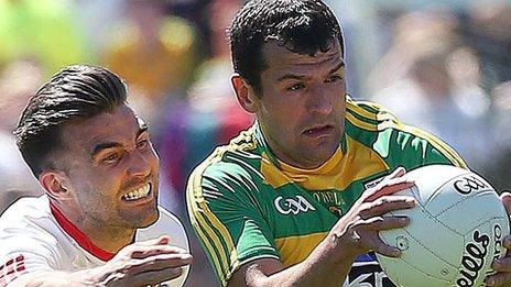 Donegal's Frank McGlynn and Tyrone's Tiernan McCann tussle for possession in last year's Ulster final