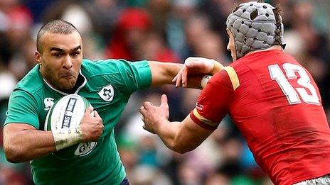 Ireland's Simon Zebo in action against Jonathan Davies of Wales